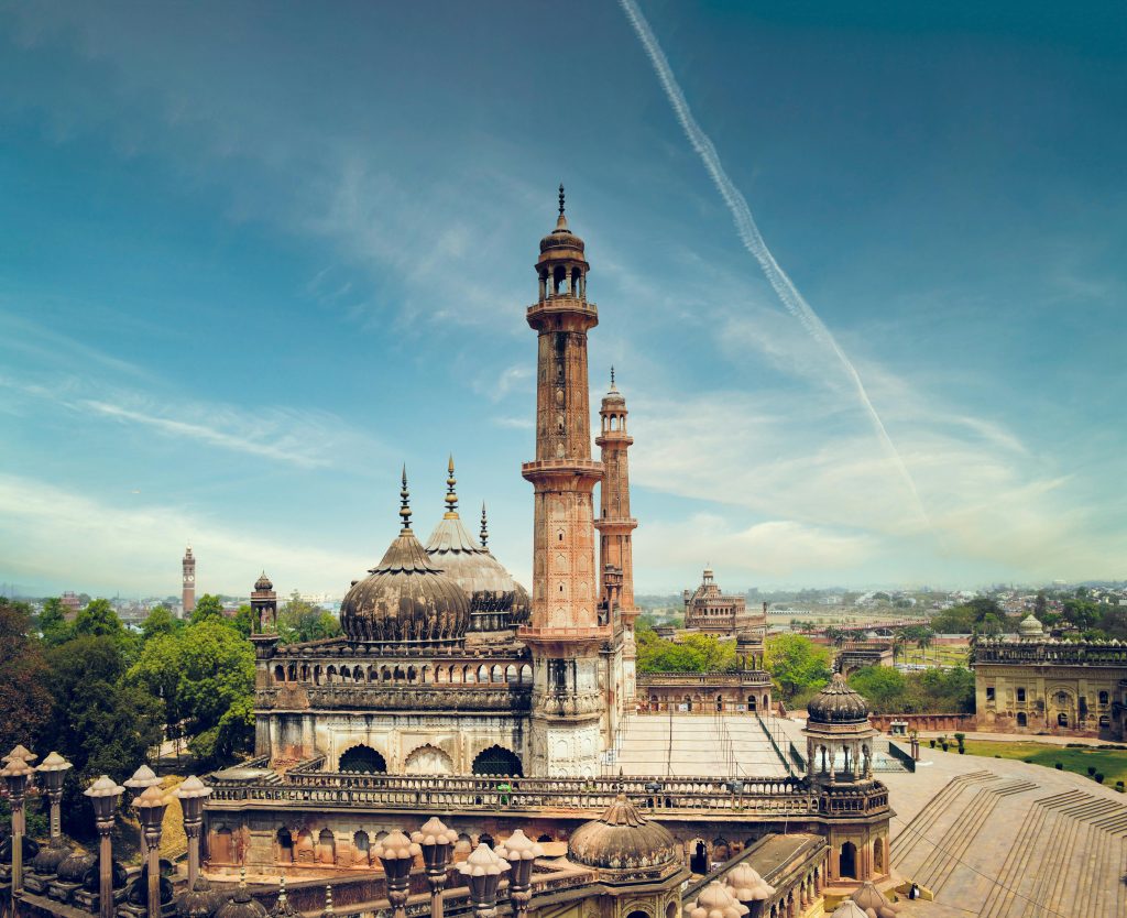A striking view of a historic mosque with minarets in Lucknow, India, showcasing architectural beauty.Top 5 Places to Visit in Uttar Pradesh in Summer